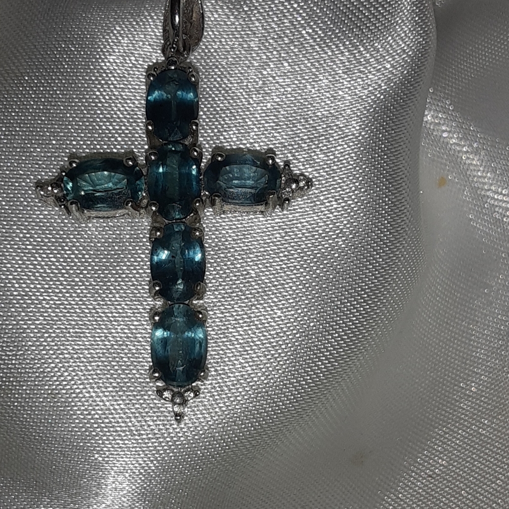 Peacock kyanite cross pendent